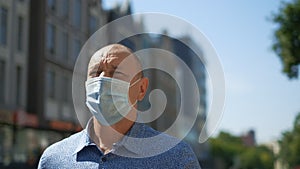 Retired human mask walk outside. Senior man protect against Covid-19 coronavirus