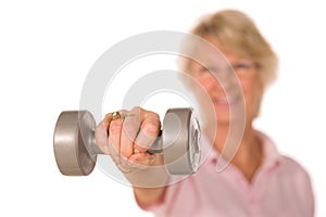 Retired lady lifting weights