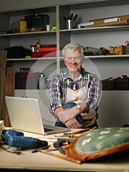 Retired man with laptop