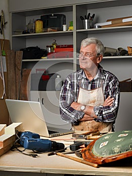 Retired man with laptop