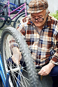 Retired man serviced bikes