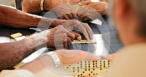 Retired Old Men Playing Domino Game With Friends