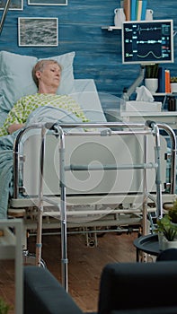 Retired patient with disease sitting in hospital bed