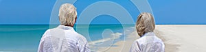 Retired Senior Couple on Tropical Beach Panorama Web Banner