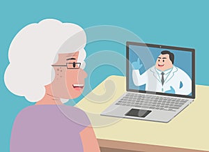 Retired senior elderly woman talking to male doctor via virtual telemedicine video call