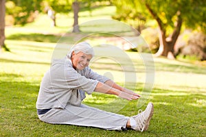 Retired woman doing her stretches