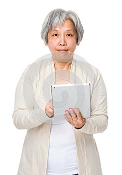 Retired woman use of tablet pc