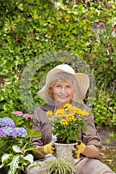 Retired woman working in the garden