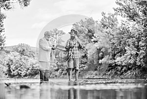 For retirement brings repose. granddad and drandson fishing. Idea attracting money. Fishermen. hobby and recreation