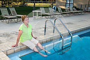 Retirement Community Senior Woman Relax by Swimming Pool