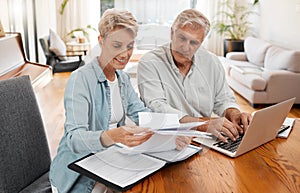 Retirement couple budget, finance and investment planning, loan and paper bills with laptop technology at home. Mature