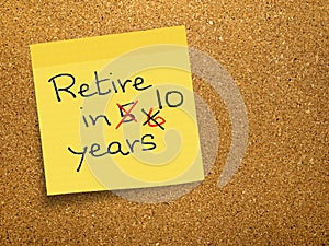 Retirement - pension delay, sticky note on cork