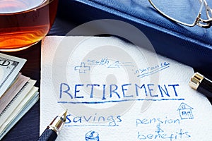 Retirement plan handwritten on a napkin. Savings for pension.