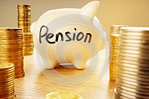 Retirement plan. Piggy bank with word pension.