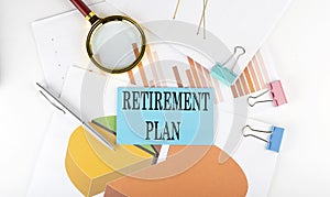 RETIREMENT PLAN text on the sticker on the paper diagram