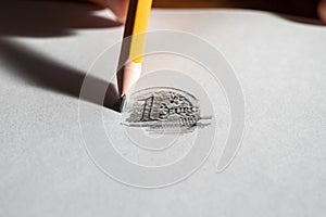Retrace Euro coin with pencil photo