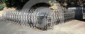 Retractable Stainless Steel Barrier Fence with Casters installed as a temporary fence, ready for use.