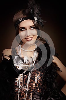 Retro 20s style woman holding champagne glass