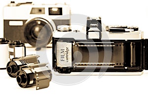 Retro 35mm camera with film opened back side.