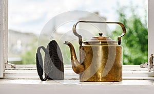 Retro aeneous teapot and cast iron