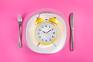 Retro Alarm Clock with Plate: Chrono Nutrition Diet Concept