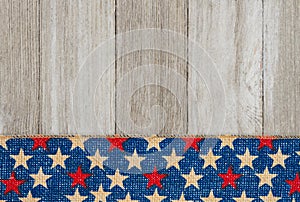 Retro American patriotic background with grunge USA stars banner on weathered wood