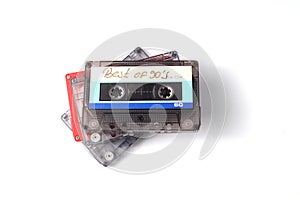 Retro audio cassette tape from the 80s and 90s on a white background.