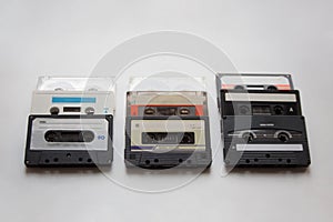 Retro audio cassette tapes on white background