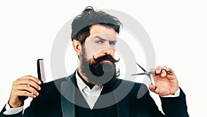 Retro bearded man, portrait of man with long beard and moustache. Barber scissors for barber shop. Vintage barbershop