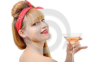 Retro beautiful pin up girl drink a glass of rose wine