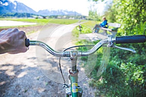 Retro bicycle handlebar and breaks outdoors, blurred background