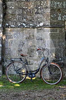 Retro bicycle by and old church