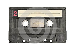 Retro black audio cassette tape isolated on white background.