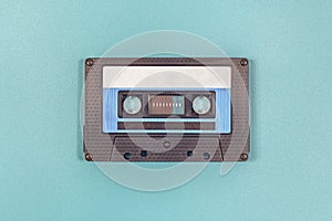 Retro black blue plastic audio cassette tape.