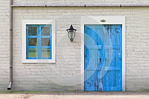 Retro Blue Door, Window, Gutter in Old Grunge White Brick Wall with Vintage Iron Lantern. 3d Rendering