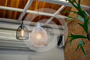 Retro bright lamp hanging on ceiling