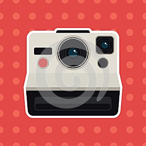 Retro camera on pattern background