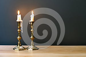 Retro Candelabra With Burning Candles In Minimalist Room photo