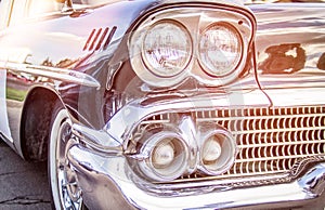 Retro car.Close-up of headlights of vintage car. Exhibition.Vintage car headlights