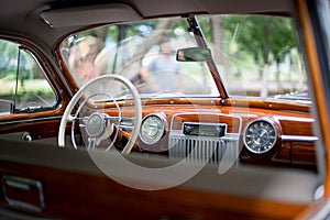 Retro car, retro torpedo car, vintage steering wheel