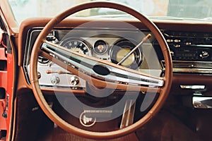 Retro car, retro torpedo car, vintage steering wheel, speedometer.