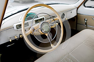 Retro car, vintage steering wheel clock, wooden