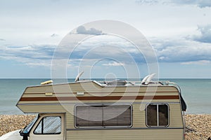 Retro Caravan on the Beach and Sea, Summer Vacation