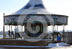 Retro carousel ride old school ride for kids at Detroit riverside walk