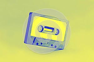 Retro cassette tape. top view. duotone style