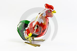 Retro chicken toy on white background