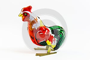 Retro chicken toy on white background