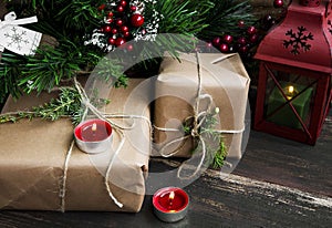 Retro Christmas Gifts under the Christmas Tree with Candles and