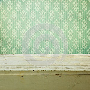 Retro classical wallpaper and wooden table