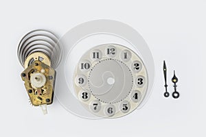 Retro clock face and hands on a white